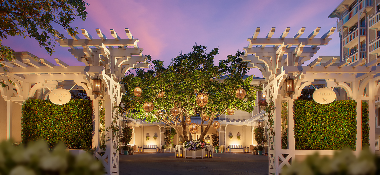 Sunset glow over the entrance to Shutters on the Beach in Santa Monica California. 