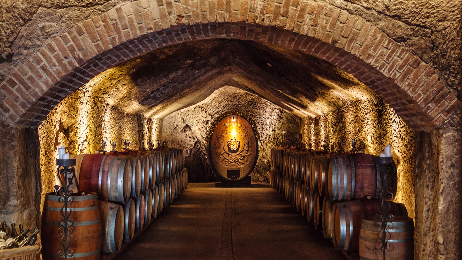 Wine cellar with barrels of wine. 