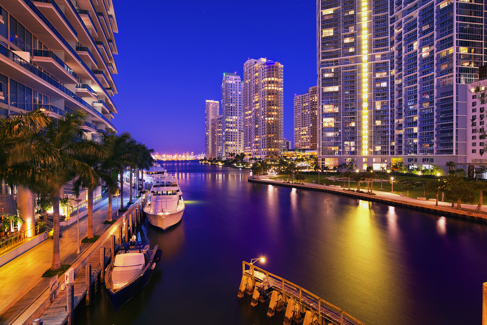 City illuminated over a canal in Miami Florida. 