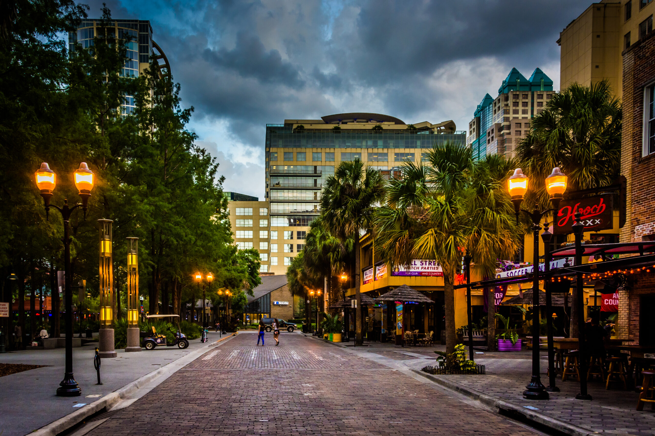 Storm clouds over a brick street in downtown Orlando, Florida.