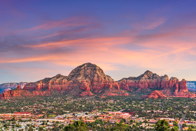 Sedona, Arizona, USA downtown skyline and mountains.