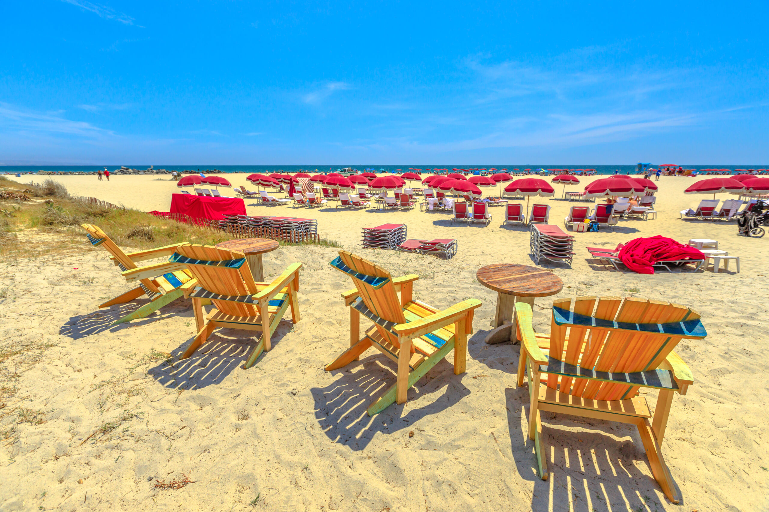 Sea chairs in Coronado Beach along Ocean Boulevard, an ideal setting for romantic beachfront hotels in Southern California.