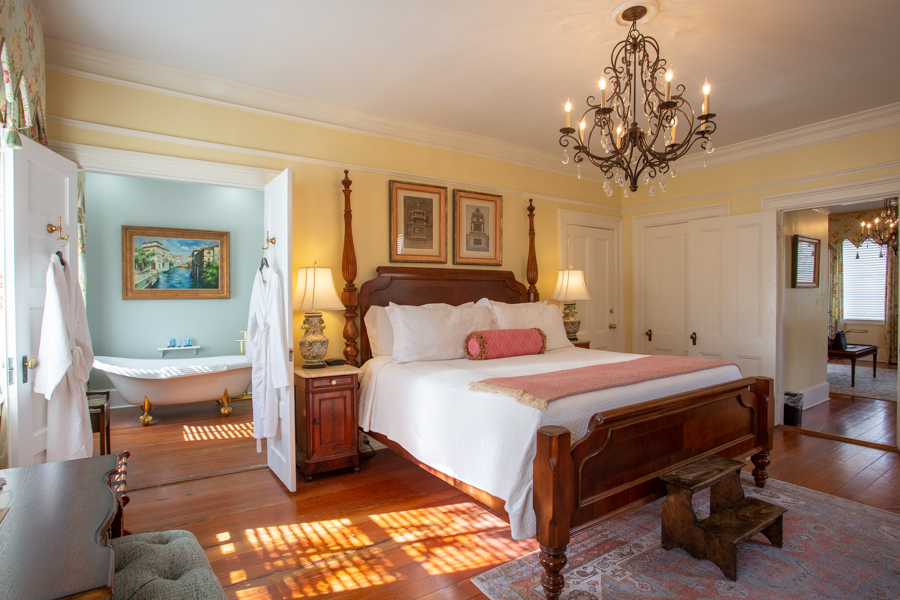 The Gastonian bedroom with claw-foot tub in Savannah Georgia.