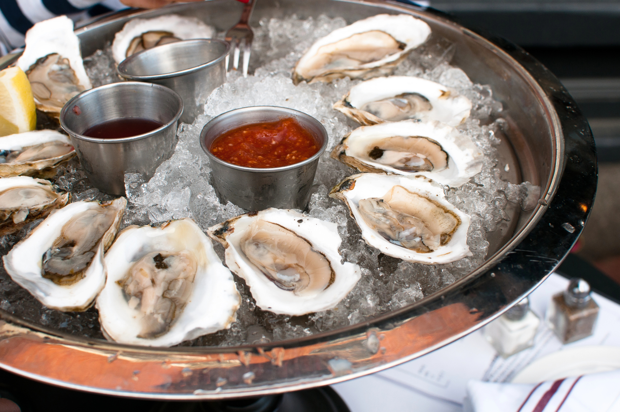 Oysters served raw with sauces.