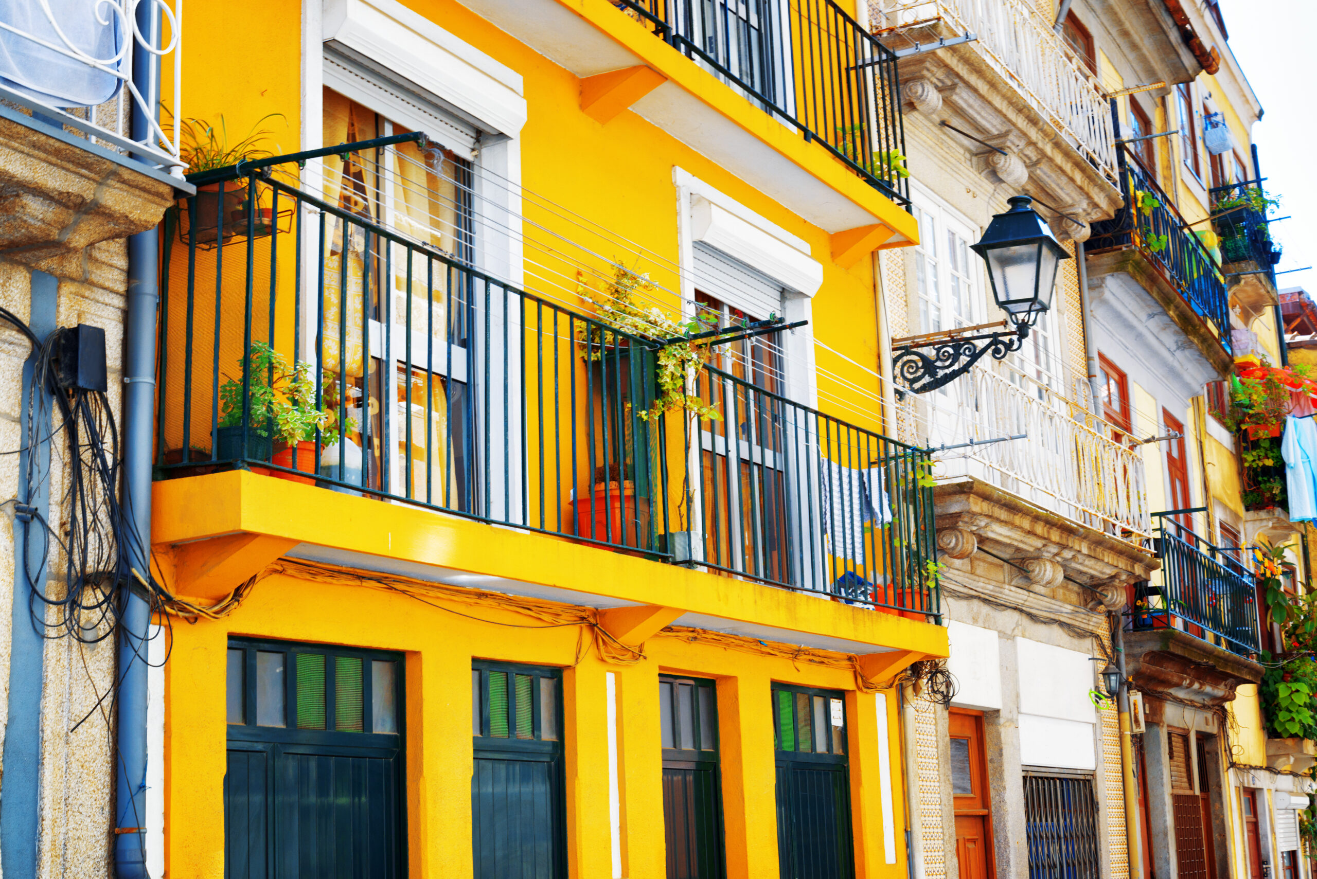 Colorful facades of old houses in Porto, Portugal. Porto is one of the most popular tourist destinations in Europe.