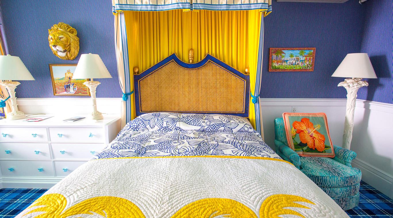 A colorful bedroom at the Grand Hotel Mackinac Island, one of the most romantic getaways in October.