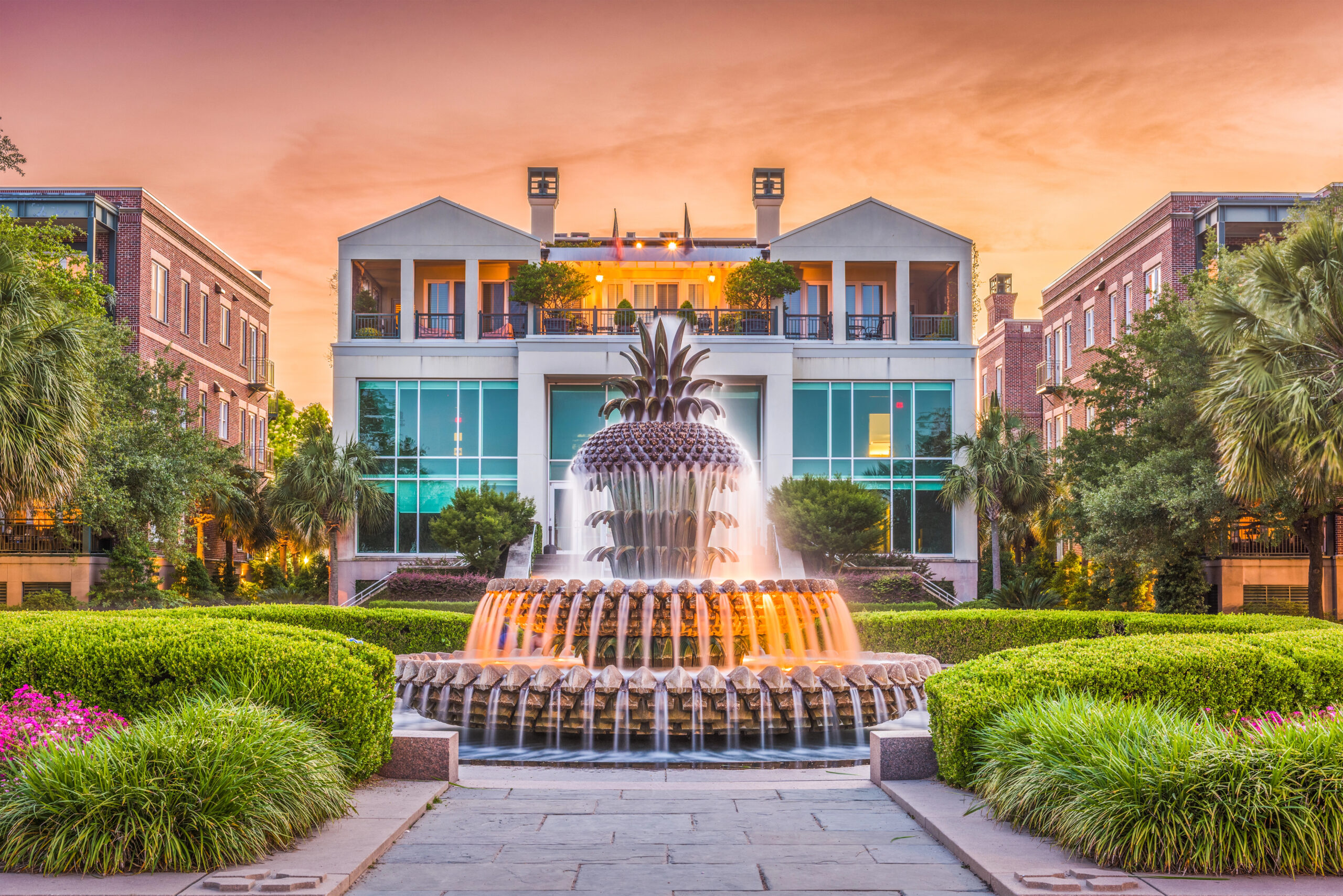 Joe Riley Waterfront Park at sunset with homes in the background, one of the most romantic things to do in Charleston SC.