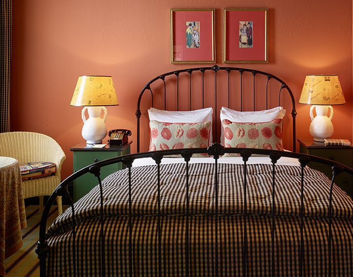 Warm-lit room in Hotel Boheme, one of the most romantic places to stay in San Francisco.