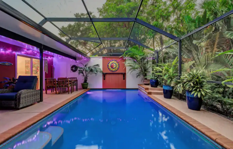 Private backyard with pool and lush garden at Roy's Place, one of the most romantic getaways in November. 