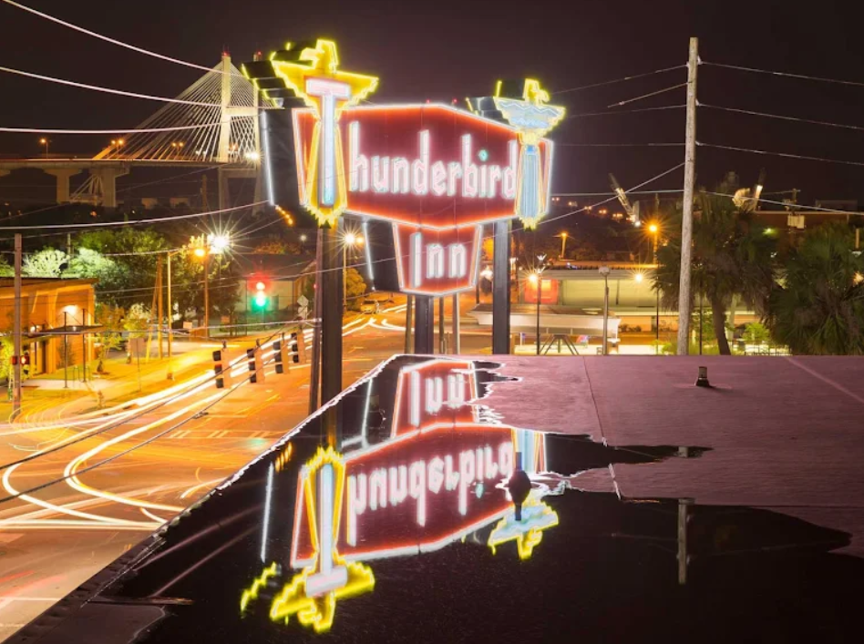 Neon sign at night for the Thunderbird Inn, one of the most romantic getaways in November. 