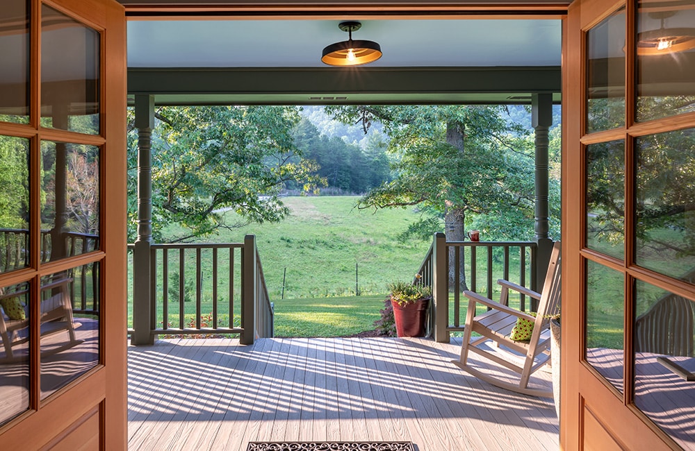 View looking out to the outdoor patio of The Inn at Amaris Farms, one of the most romantic places to stay in Asheville NC.
