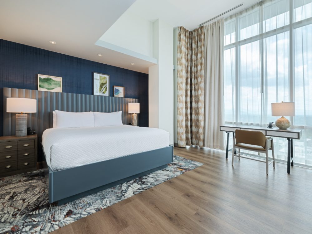 King bedroom with a view at Hotel Indigo, one of the most romantic places to stay in Asheville NC.