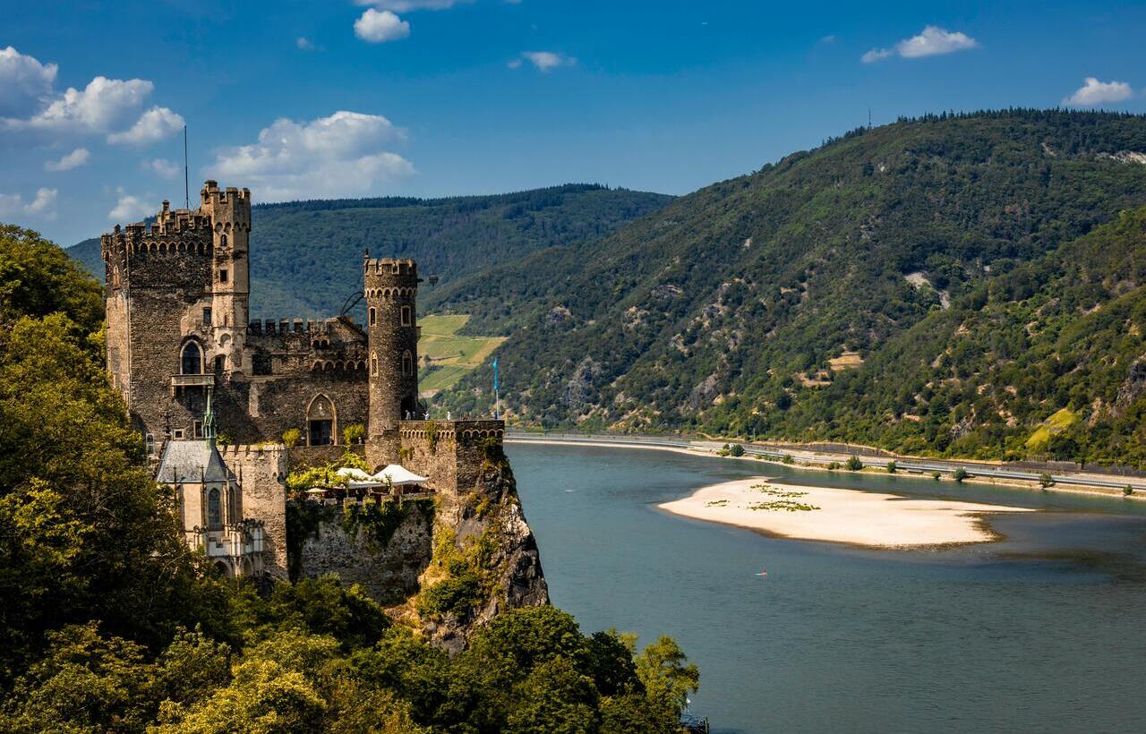 Burg Rheinstein castle overlooking the Rhine River in Germany.