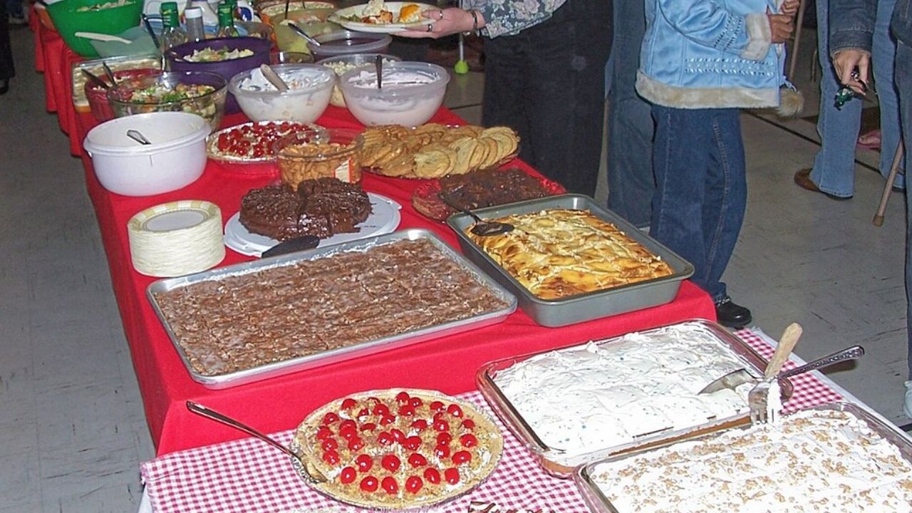 A table filled with homemade Southern dishes and desserts, showcasing classic American comfort food cultur