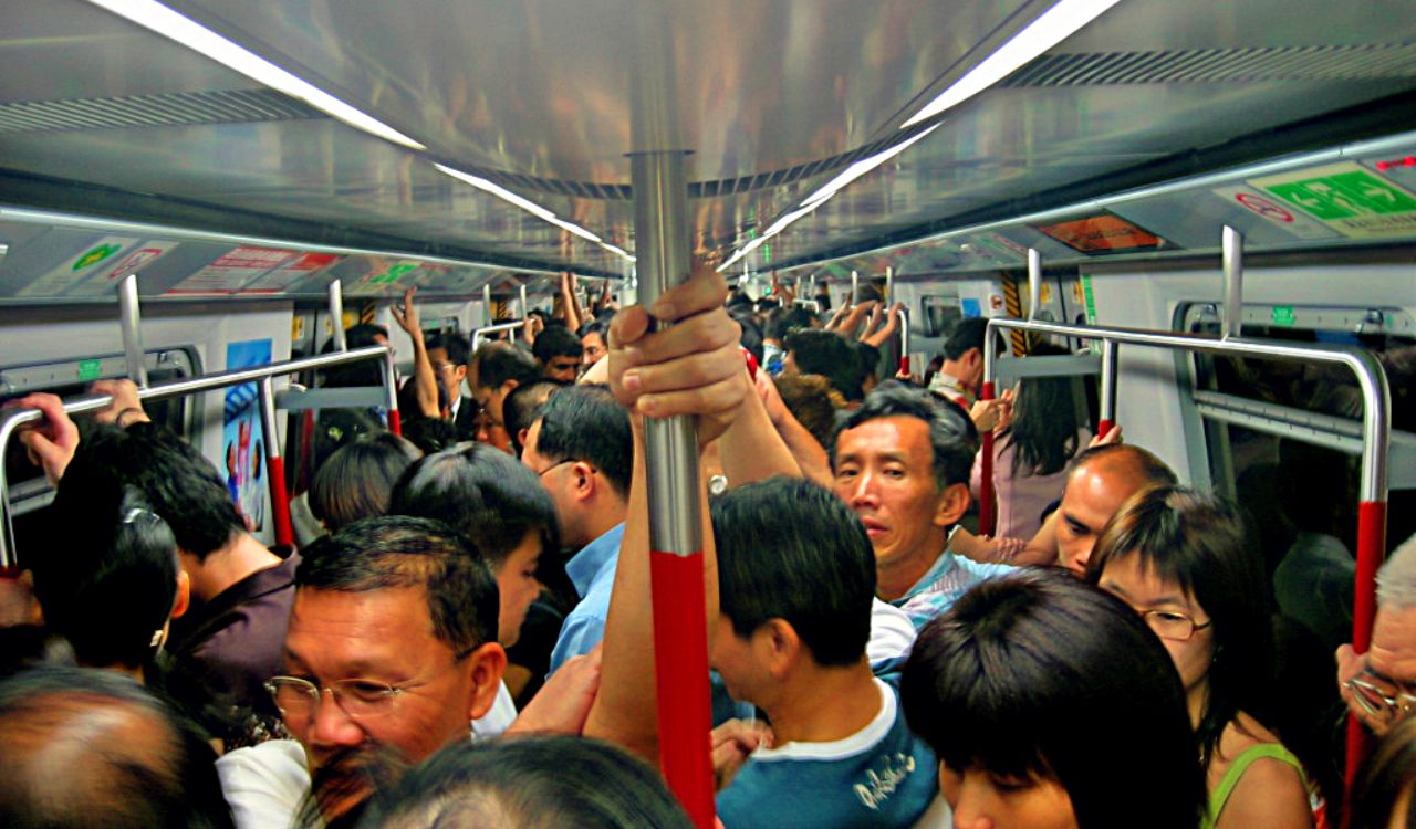 Crowded subway ride showing travelers connecting on the go