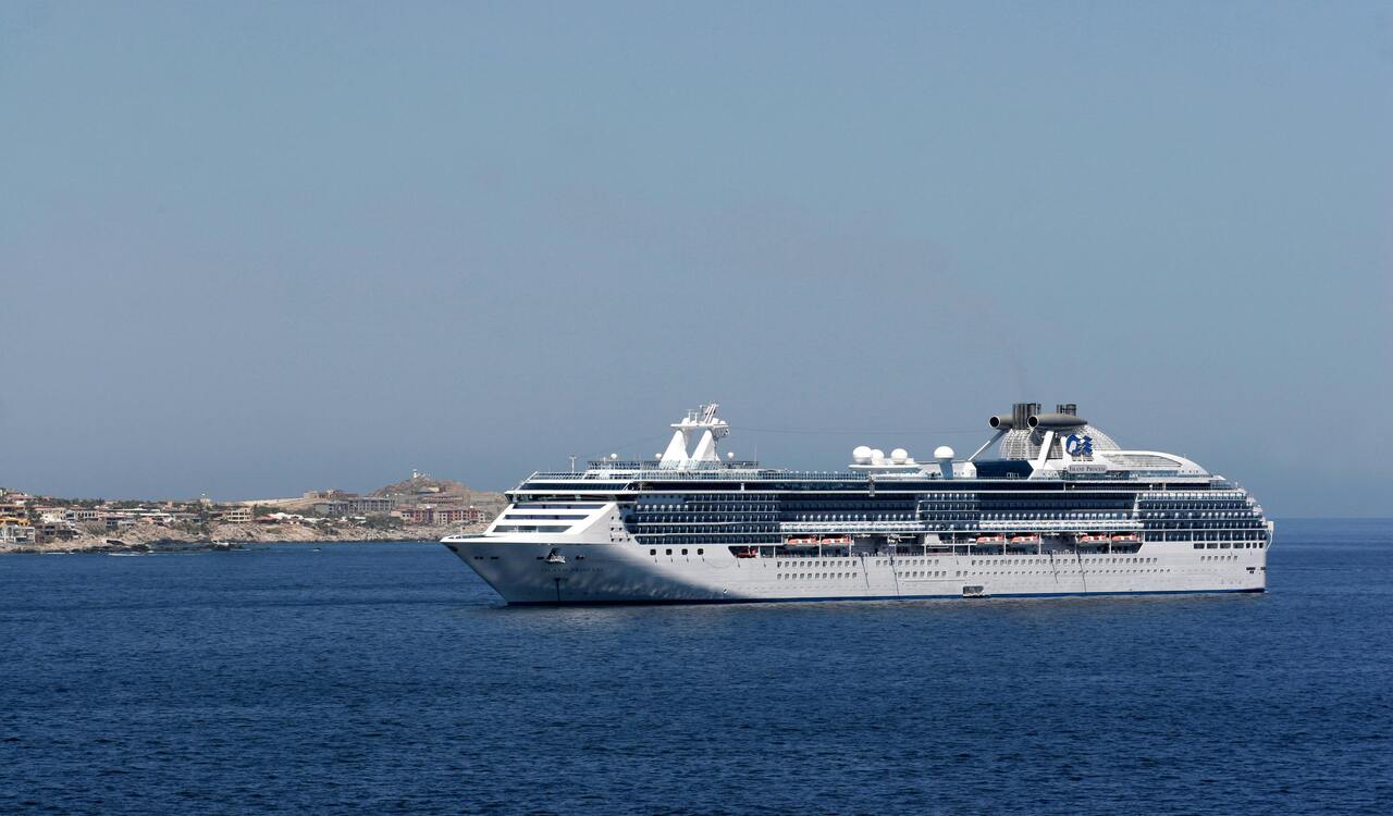 White Cruise Ship Sailing on Sea