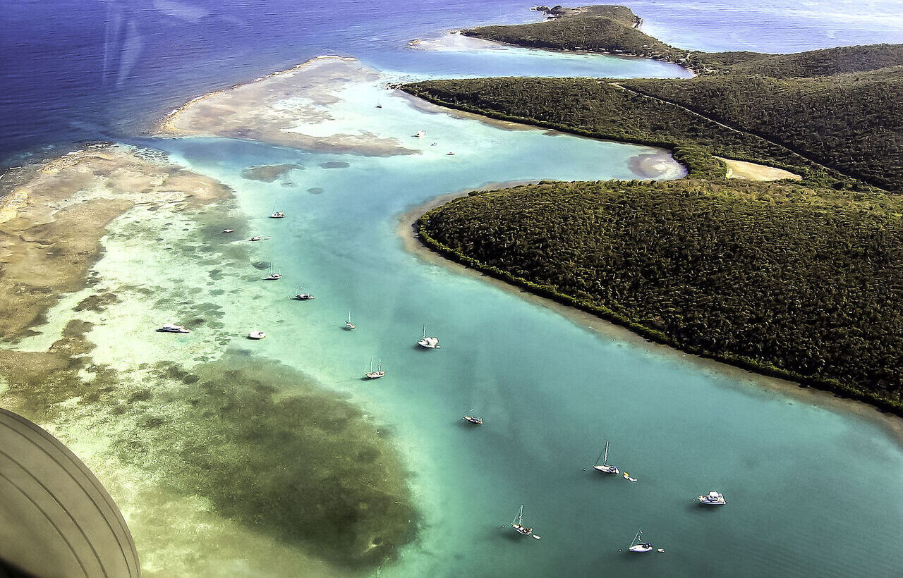 Aerial view of turquoise waters and anchored boats near Culebra, Puerto Rico.