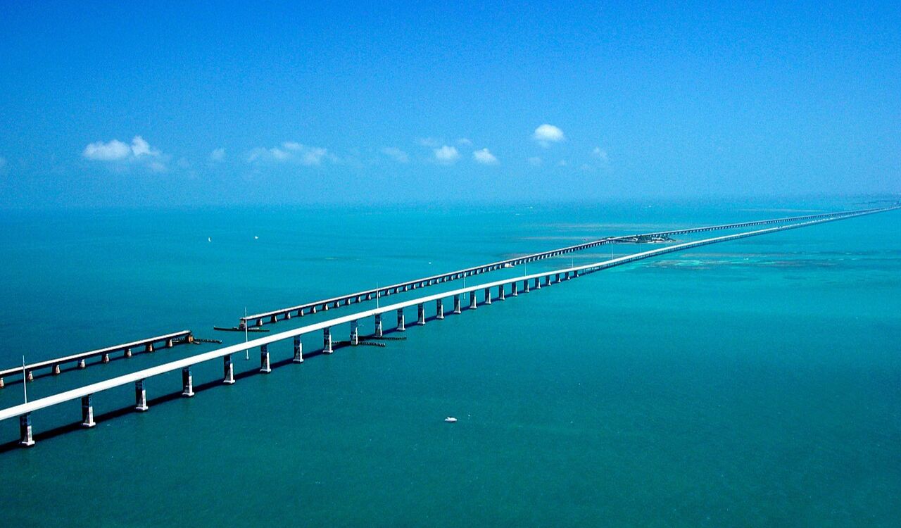 A long bridge stretches across turquoise waters on the way to Key West