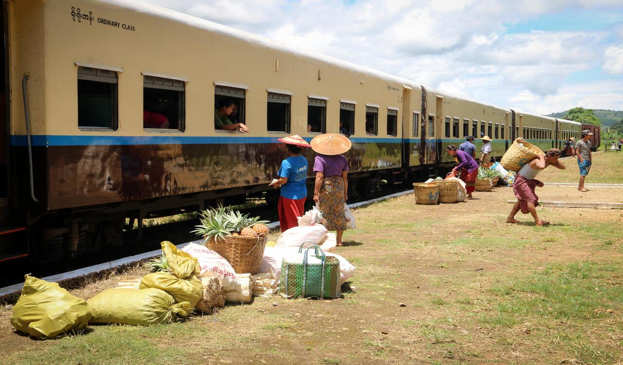 People Selling Goods to Other People in a Train