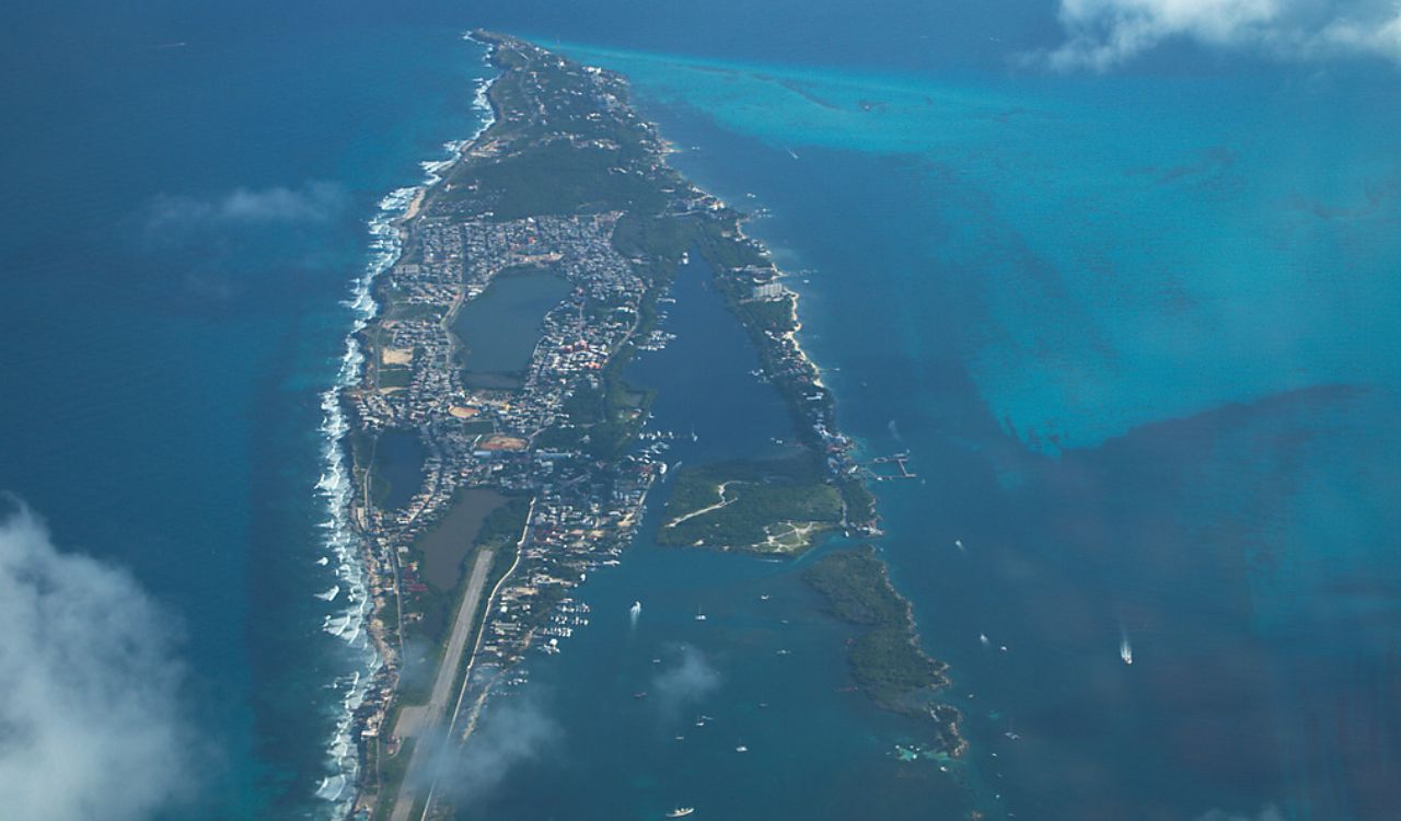 Aerial view of Isla Mujeres, Mexico, surrounded by turquoise Caribbean waters