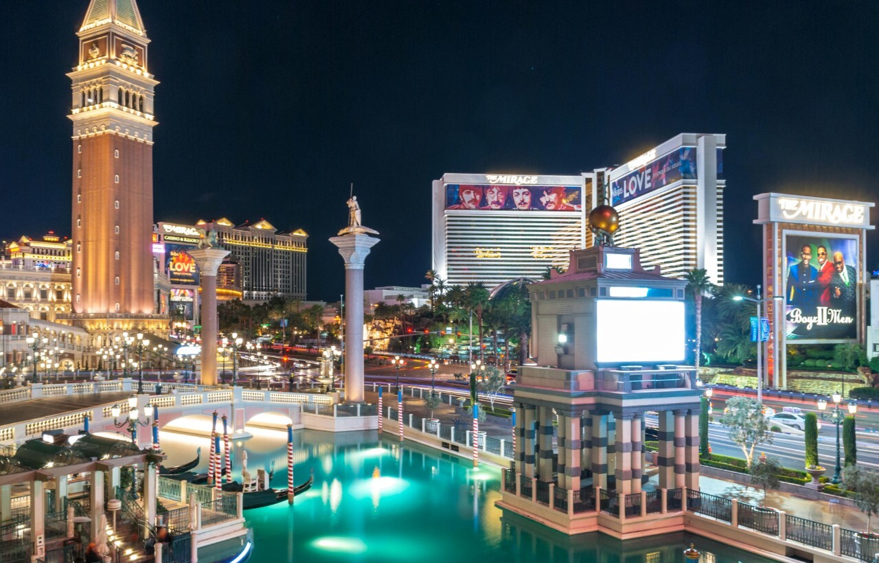 Las Vegas Strip with Venetian canals and Mirage hotel.