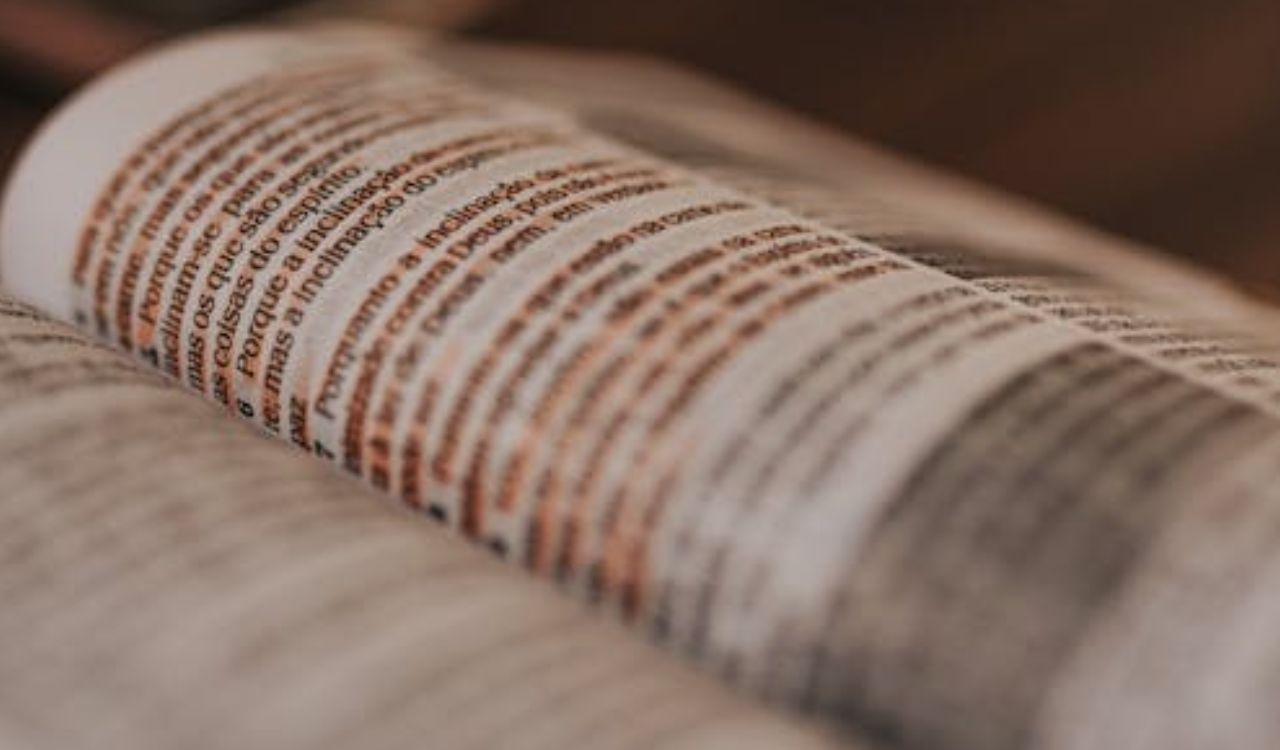 Close-up of a book page with text in Hungarian