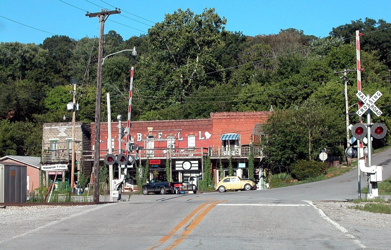 Historic brick storefronts by railroad crossing in Makanda, Illinois.
