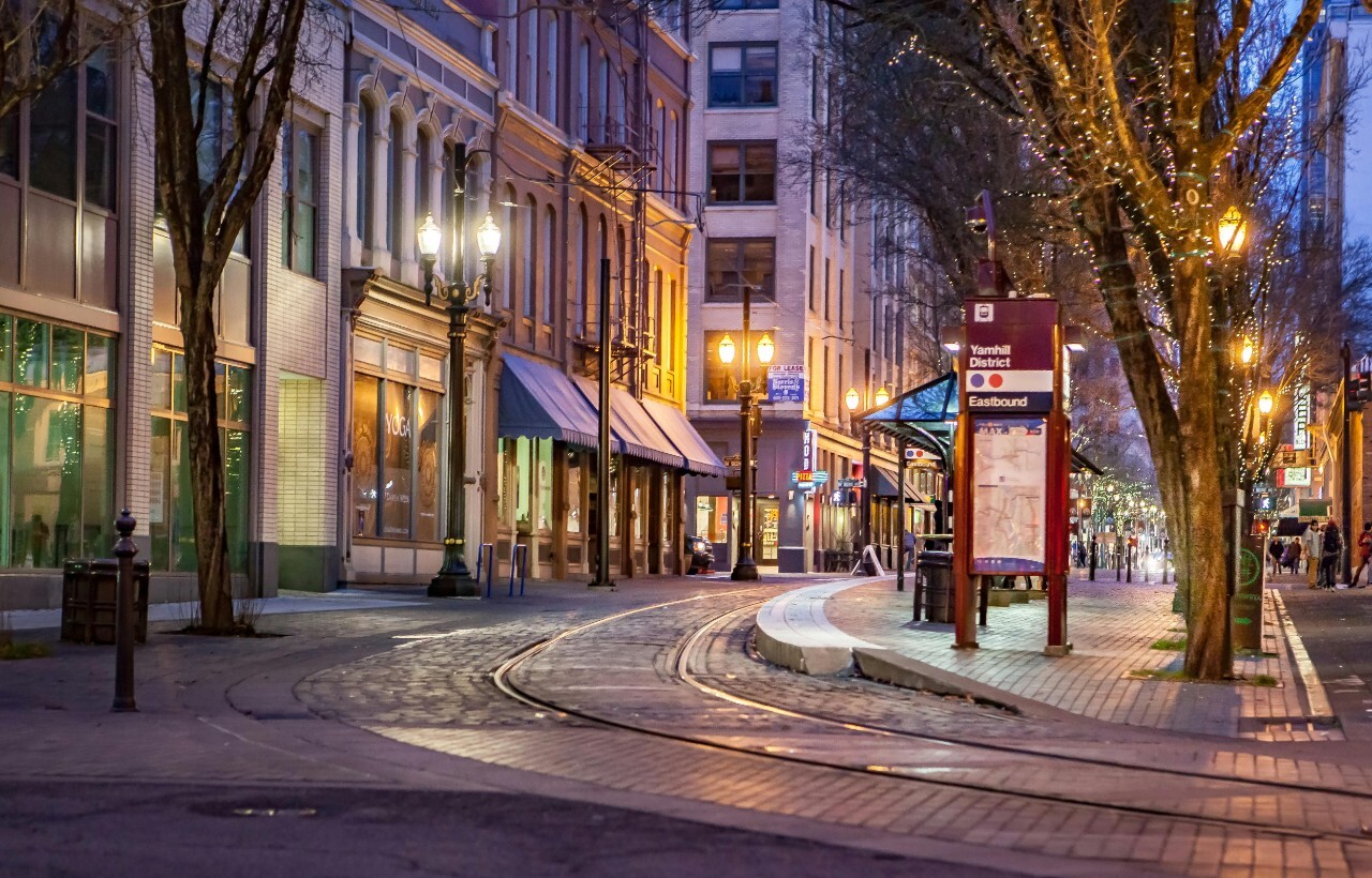 Quiet evening street with tram tracks in Portland’s Yamhill District.