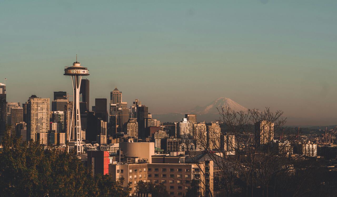 Seattle skyline with Space Needle and Mount Rainier.