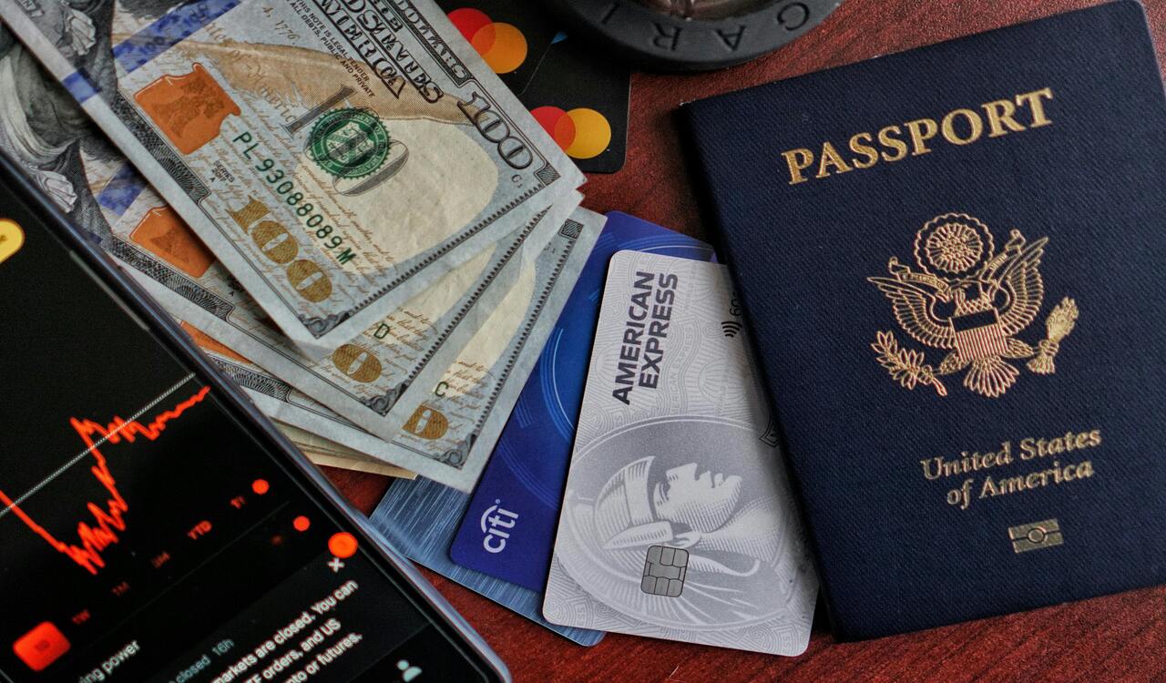US Passport with Cash, Credit Cards, and Smartphone