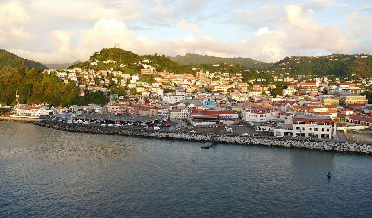 Seaside town view of St. George’s, Grenada at sunset