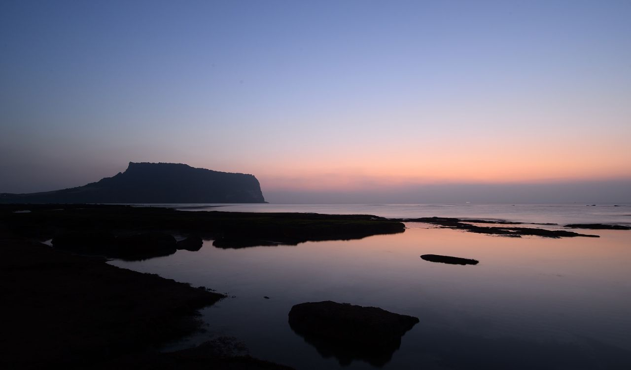 Catch sunrise atop Korea's volcanic crown