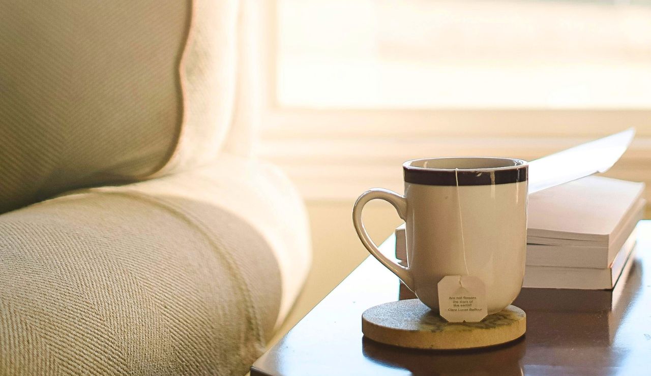 Quiet café corner with coffee, book, and window view