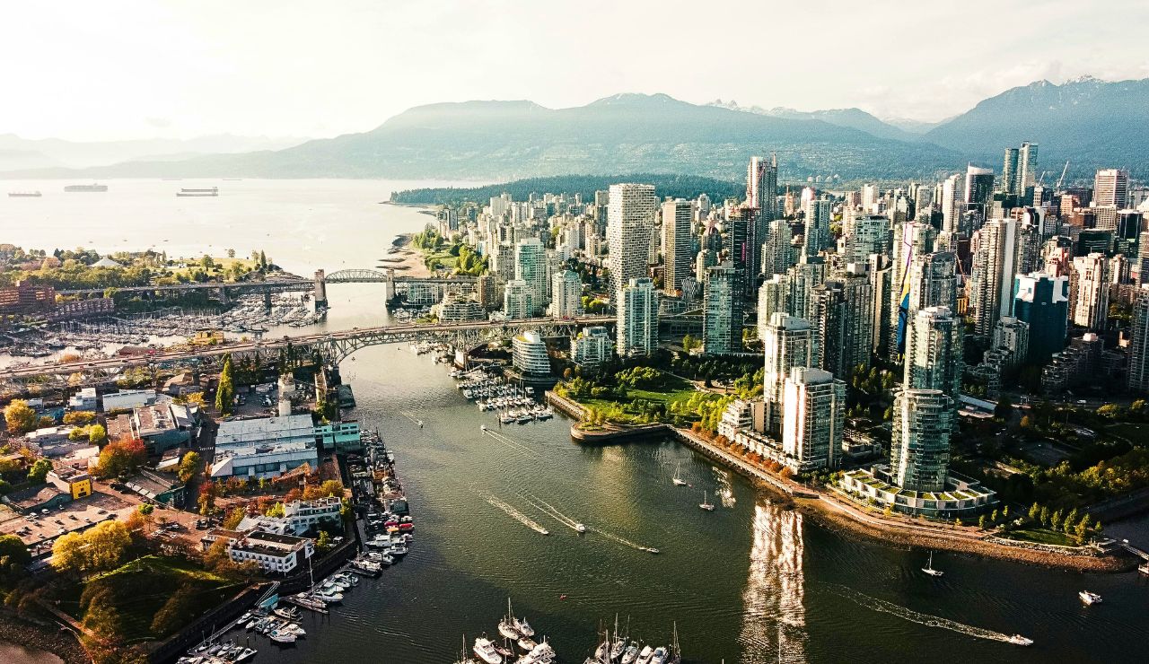 Vancouver skyline with mountain backdrop.
