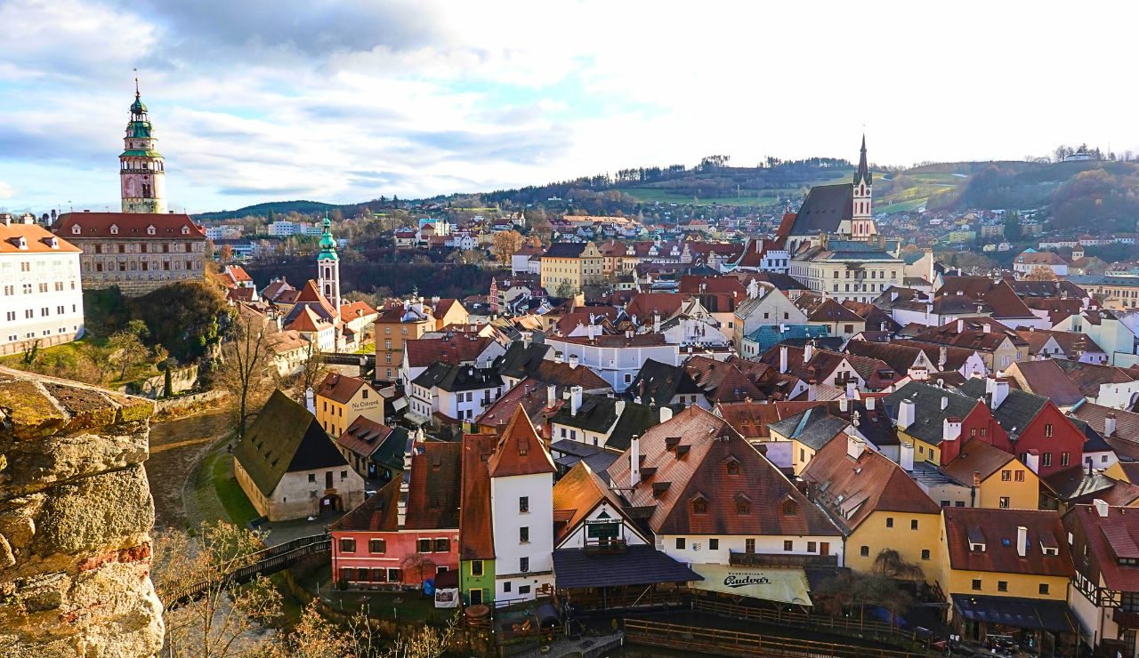 Fairytale castle and old town nestled along a river in South Bohemia
