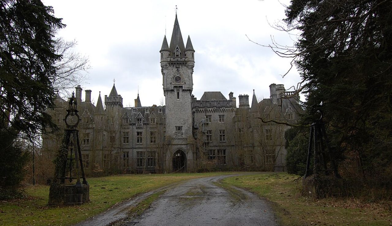 Abandoned Château Miranda (Château de Noisy) in Belgium with Gothic architecture.