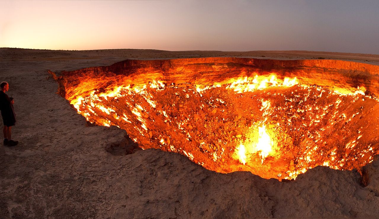Darvaza Gas Crater in Turkmenistan burning brightly at sunset