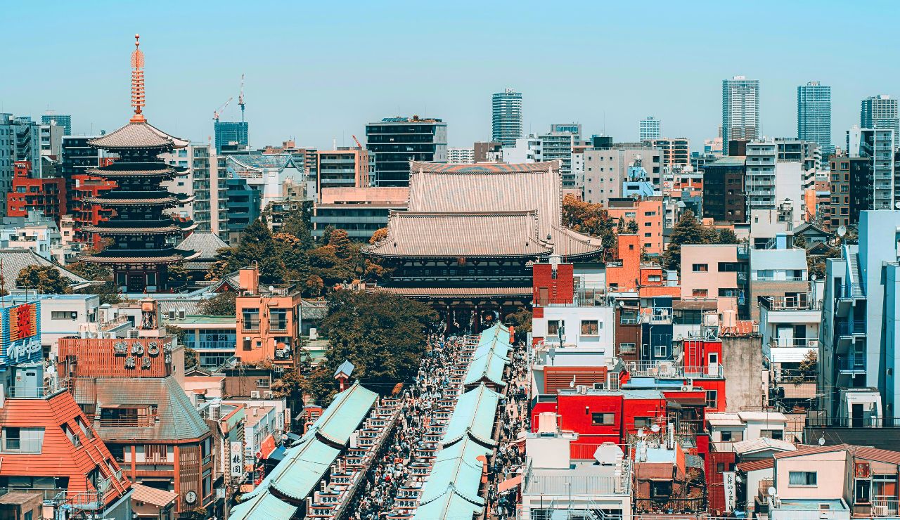 A Tokyo street with modern and traditional architecture.