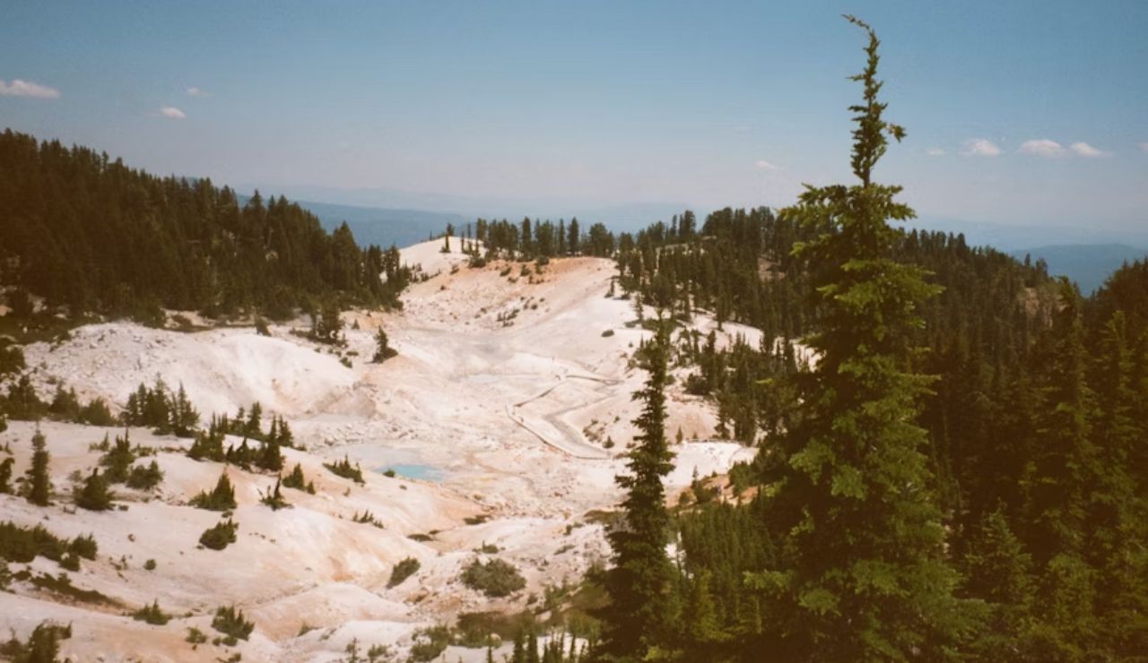 Hydrothermal basin surrounded by forest at Lassen Volcanic National Park, California.