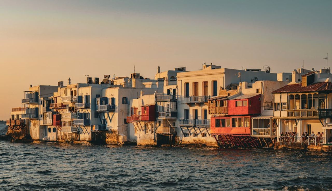 Sunset view of Little Venice waterfront houses in Mykonos, Greece.