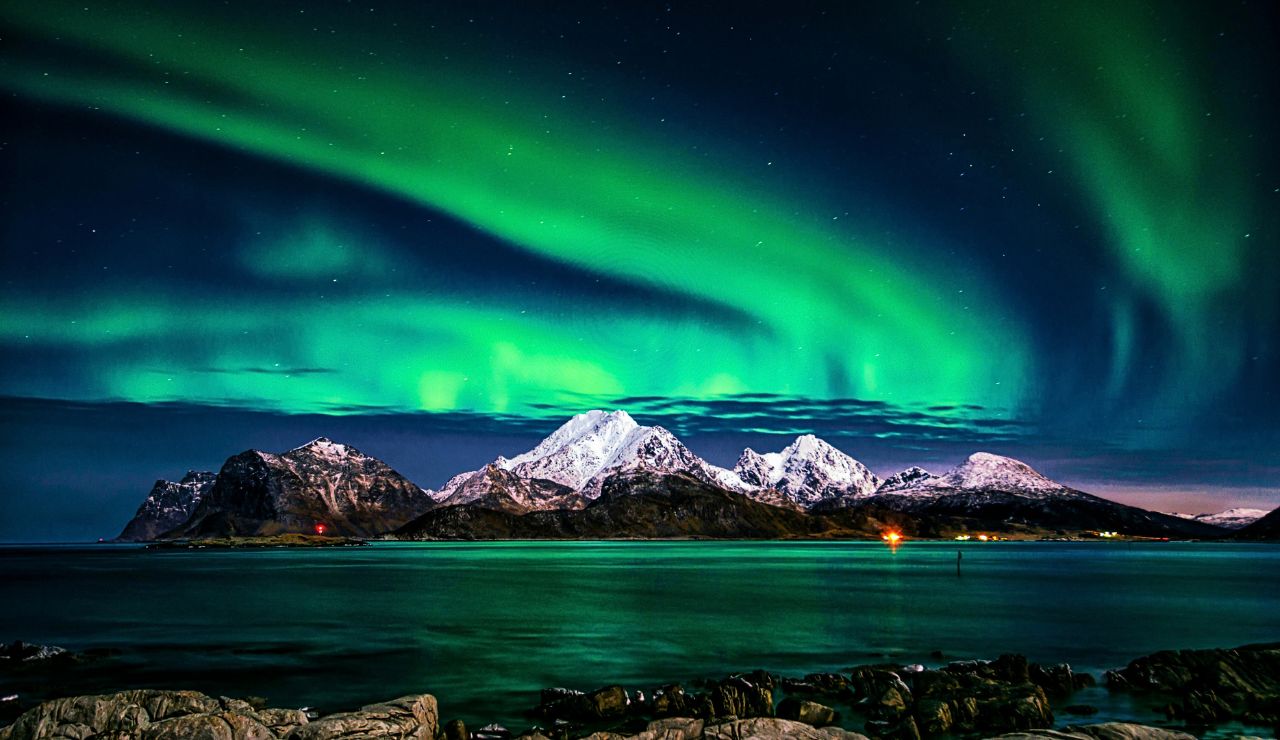 Lofoten Islands with snow-covered peaks.