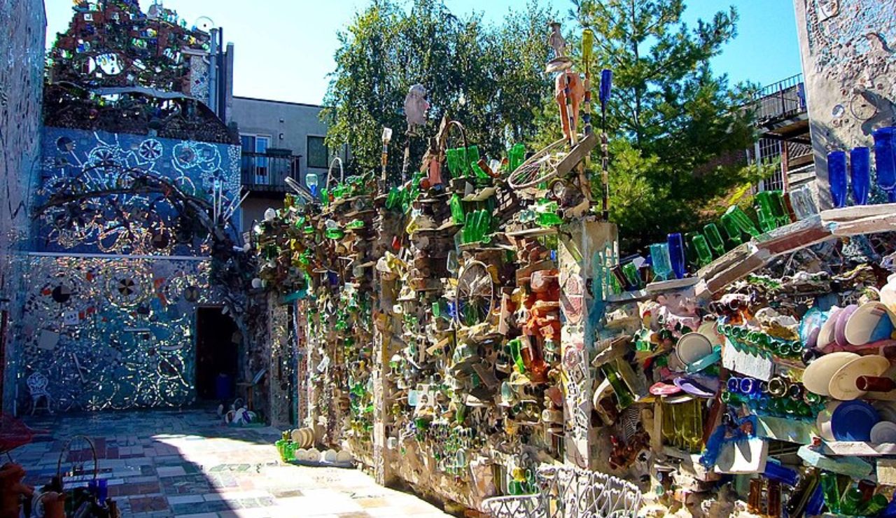 Philadelphia’s Magic Gardens outdoor mosaic art installation featuring colorful tiles, glass bottles, ceramics, and sculptures on South Street.