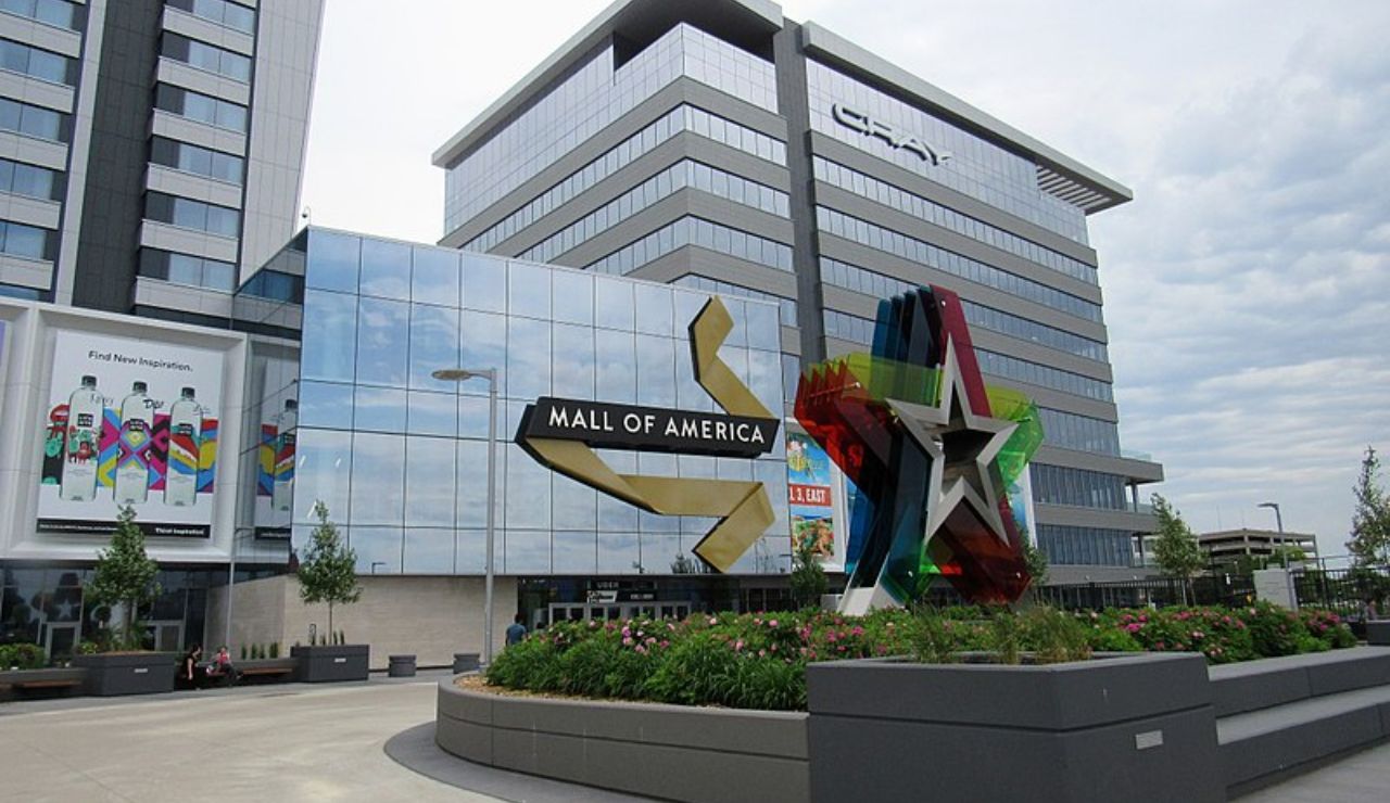 Exterior view of Mall of America entrance with modern sculpture and surrounding office buildings in Bloomington, Minnesota