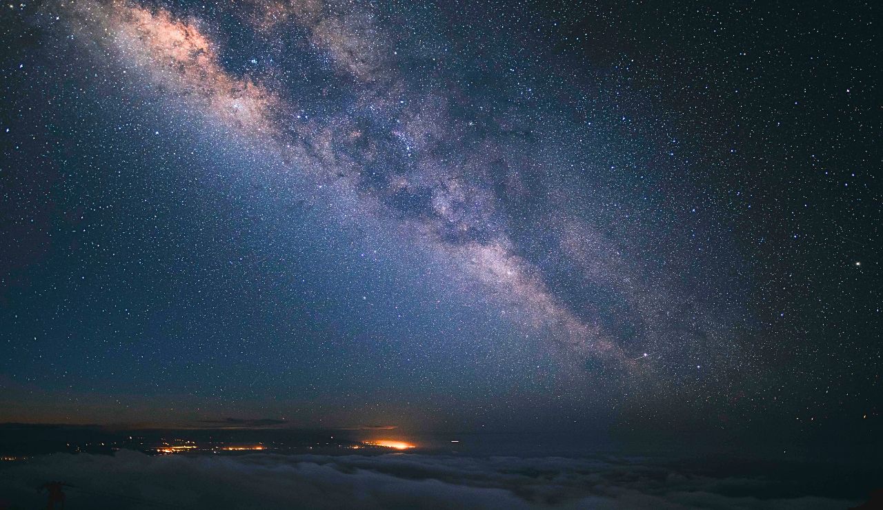 Mauna Kea slopes at twilight with stars above