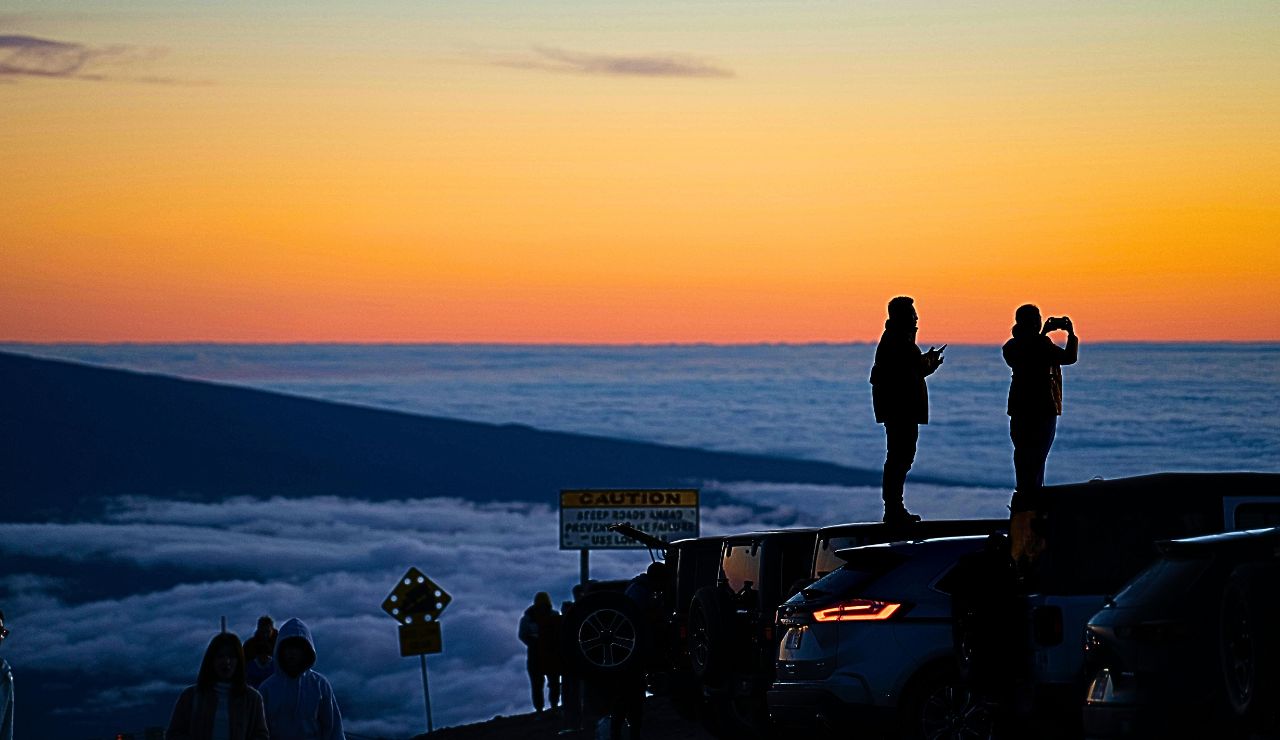 Tour van parked near telescopes at Mauna Kea summit