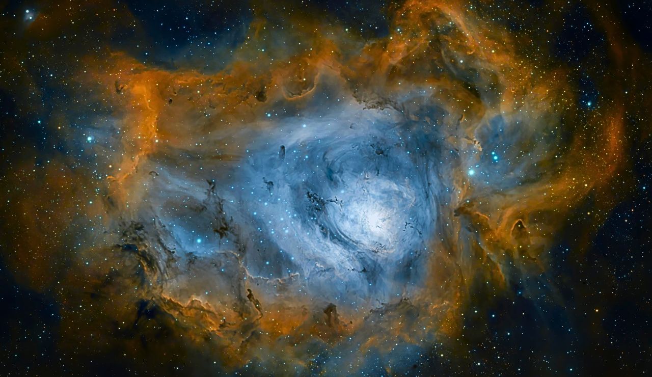 Telescope aimed at night sky with stars overhead