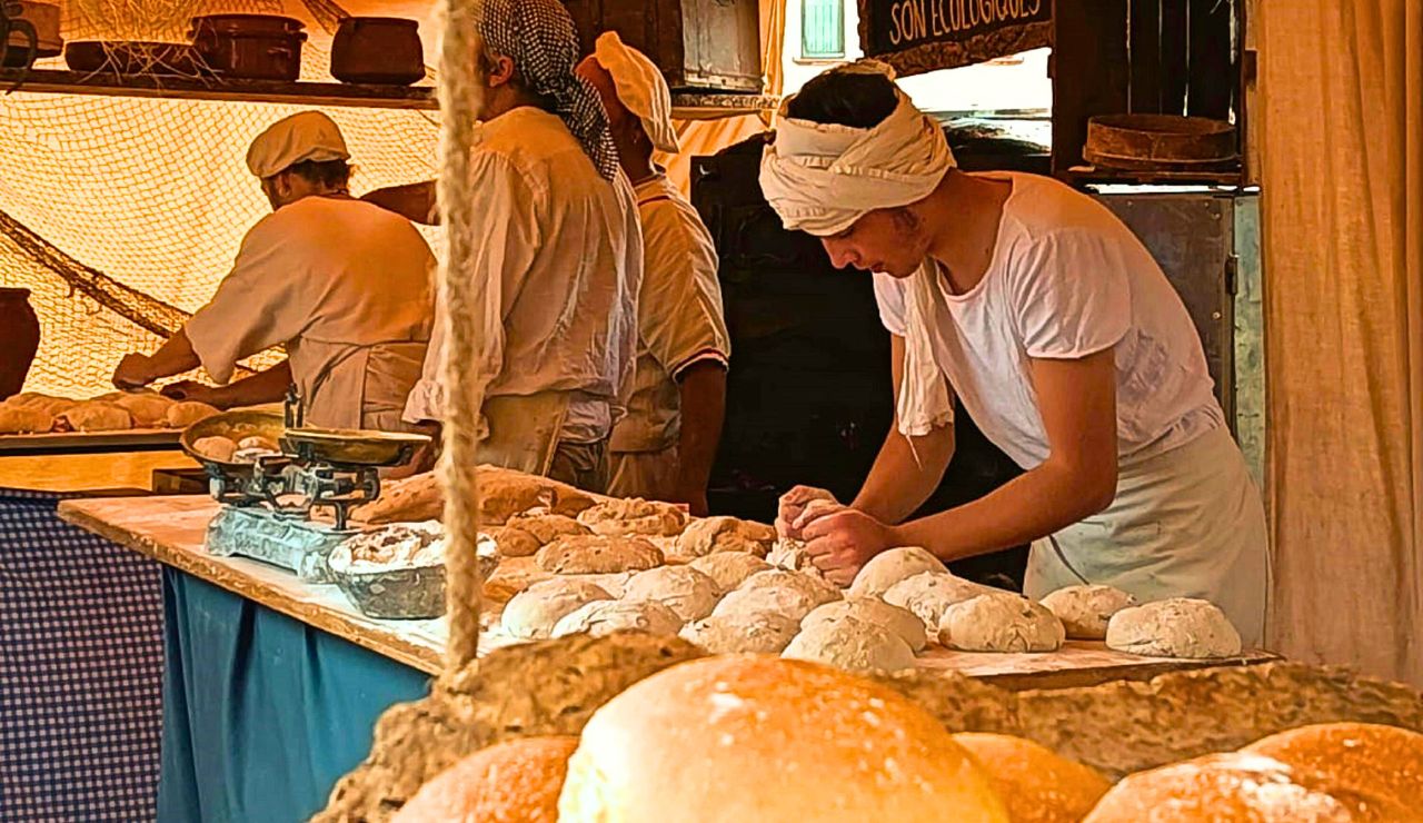 Fresh produce and bread at a quiet morning market stall