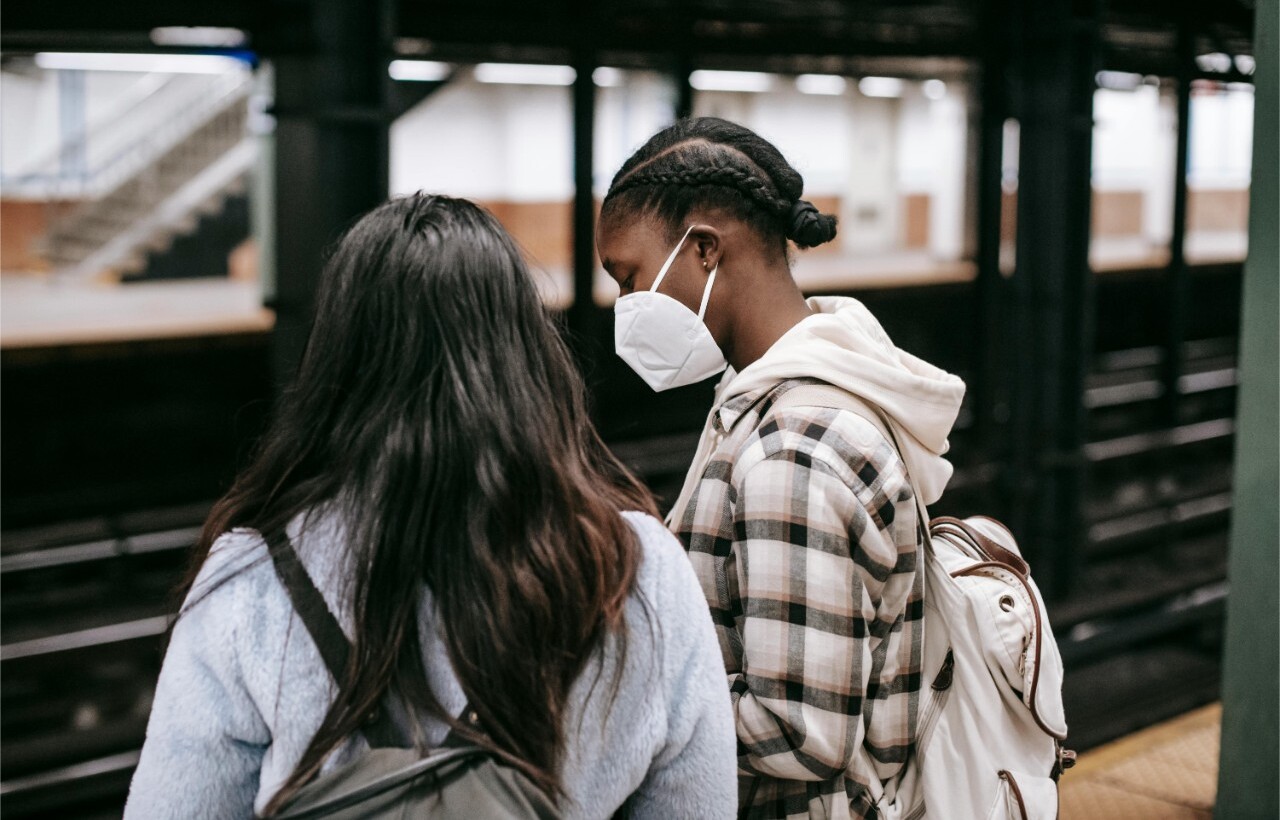 Two women at a subway platform in New York.