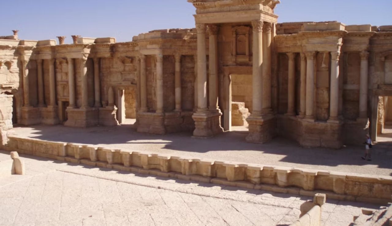 Palmyra, Syria – Ancient Roman theater ruins in the desert sun.