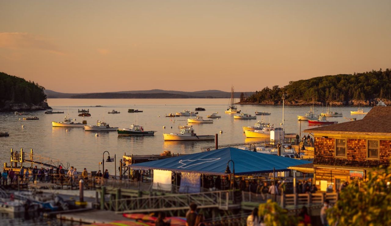 Fishing boats in the harbor at sunset in Bar Harbor, Maine.